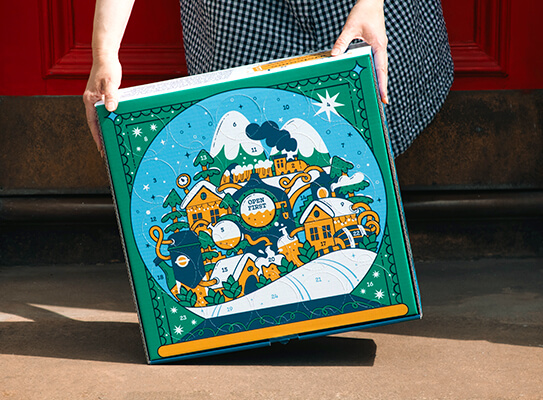 handing over a Beer52 Craft Beer Advent Calendar box on a doorstep